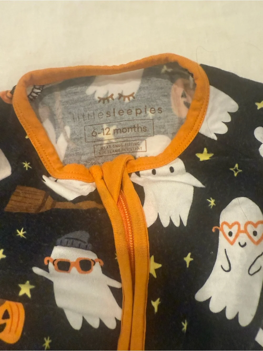 Little Sleepies Black Ghost Print Footed One-Piece with Orange Trim